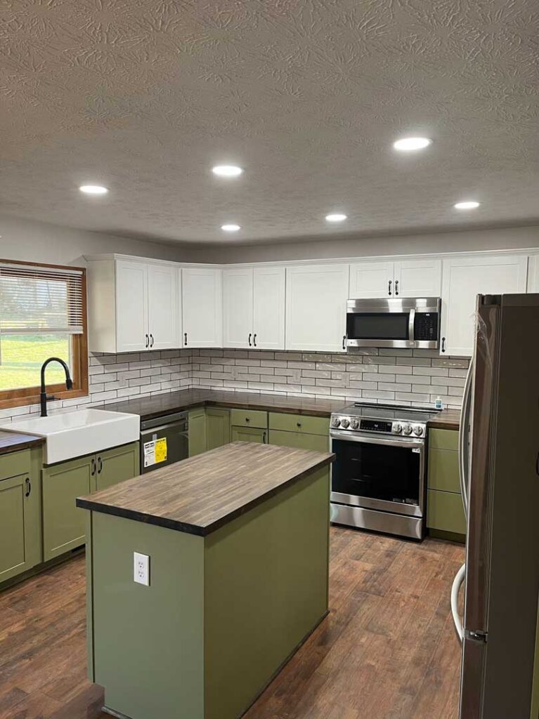 Kitchen remodel with green cabinets
